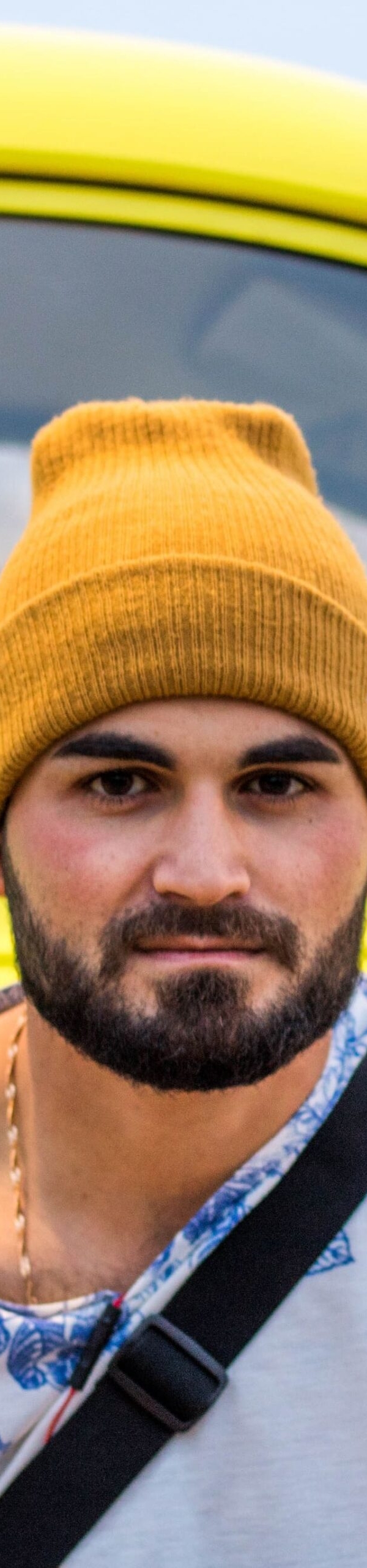 portrait-man-against-yellow-car (1)
